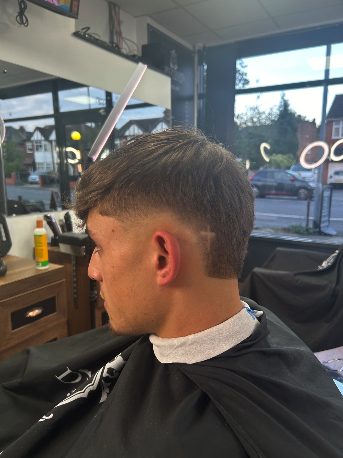 Defined curls with clean fade