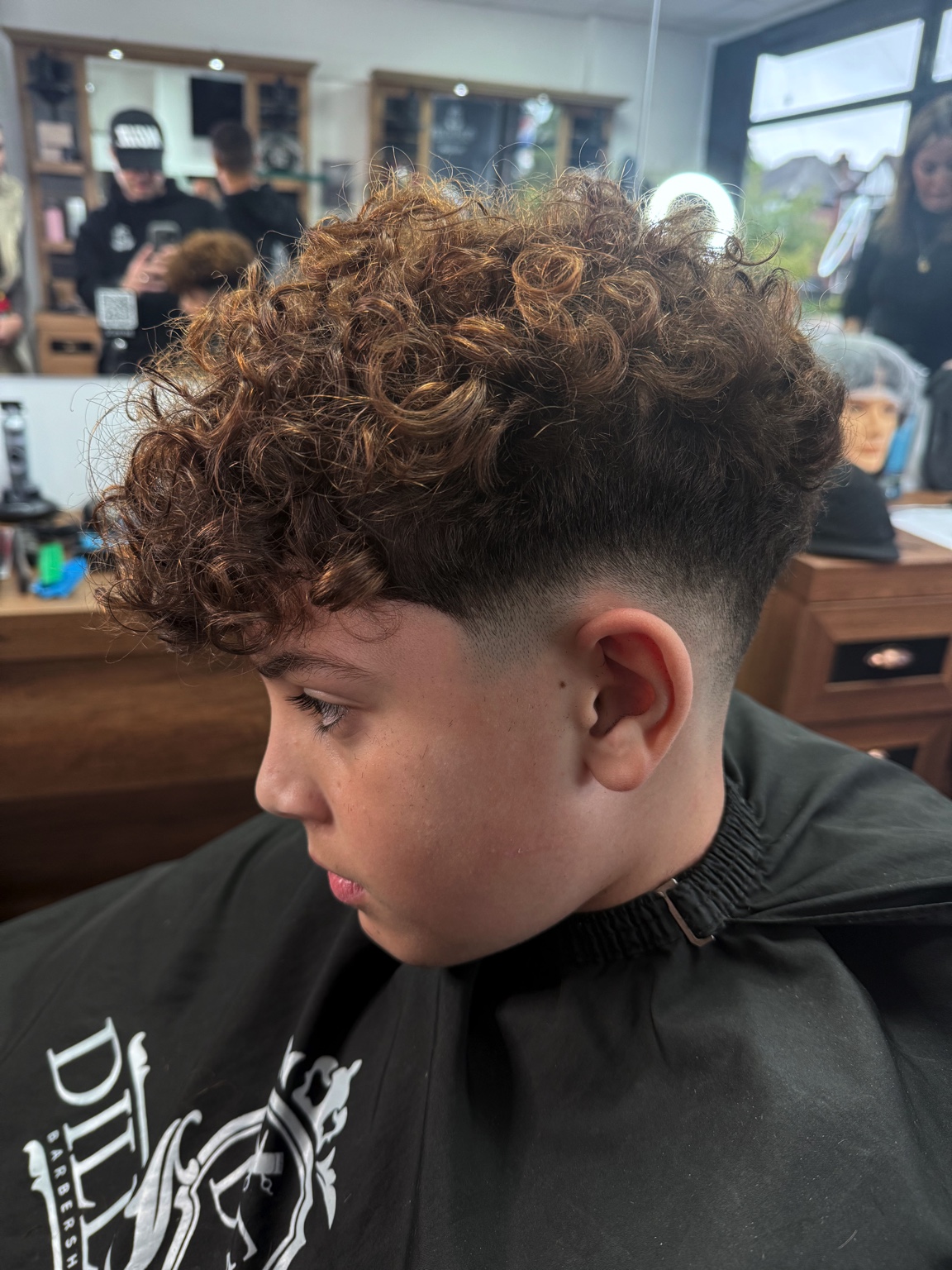Curly top with skin fade