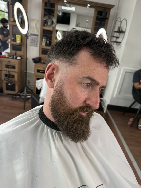 Fresh fade with a sculpted beard