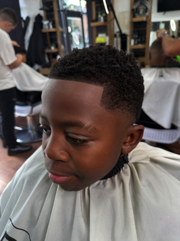 Tight fade with a textured top