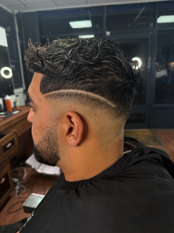 Detailed pattern cut into the hair